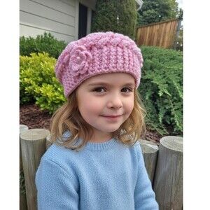 Pink crochet beret with a flower for girl.